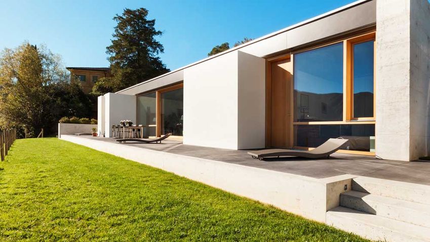 garden and modern house with sun lounger